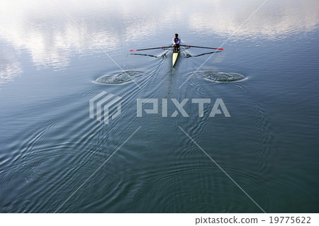 Young man rowing 19775622