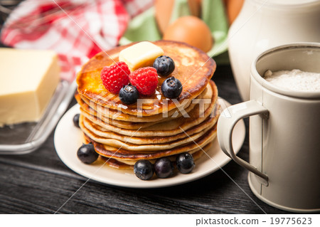 High pile of delicious pancakes 19775623