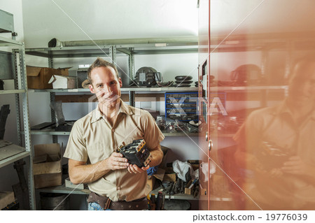 Elevator Repair Man at work 19776039