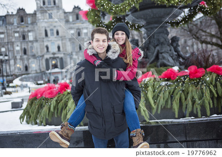 Image of affectionate couple in park on winter 19776962