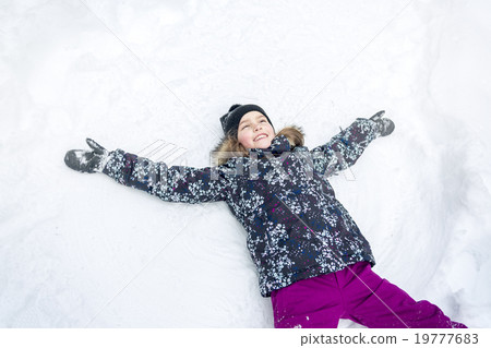 Little child in a clear white snow 19777683