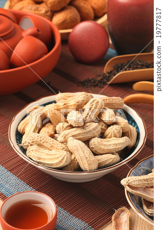 Chinese tea with peanuts on the wood table 19777817