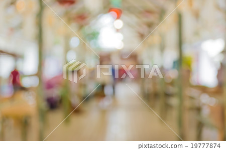 Blurred image of people walking at day market Blurred image of people walking at day market 19777874