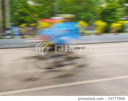 A racing bike rider's slow speed shutter A racing bike rider's slow speed shutter 19777906