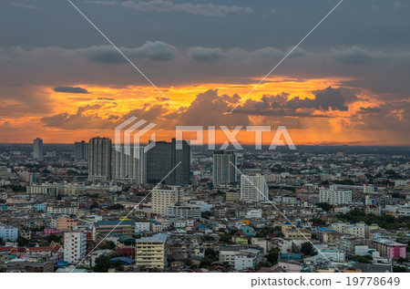Fantastic sun light at sunset time over cityscape 19778649