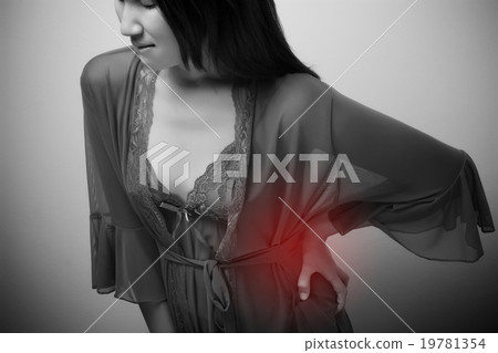 Loin stretch shown with red spot on woman spine. Young female to Loin stretch shown with red spot on woman spine. Young female to 19781354
