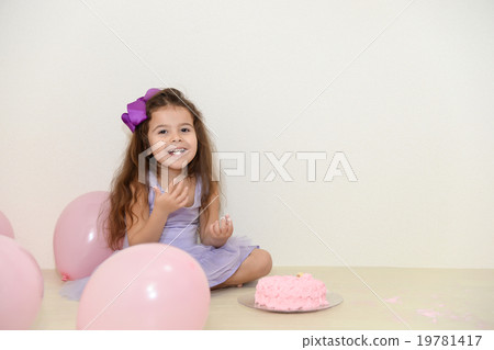 Girls eating cakes with hands 19781417