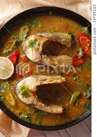 fish curry with vegetables closeup top view 19789283
