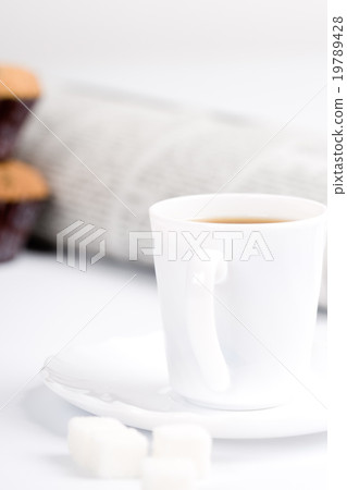 coffee, sugar, muffins and newspapers 19789428