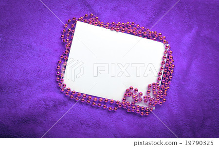 Christmas golden beads on violet background Christmas golden beads on violet background 19790325