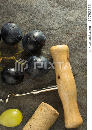 corkscrew and wine cork corkscrew and wine cork 19792226