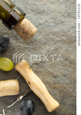 corkscrew and wine bottle with grape corkscrew and wine bottle with grape 19792228