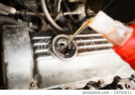 Motor oil, car engine close up Motor oil, car engine close up 19792611