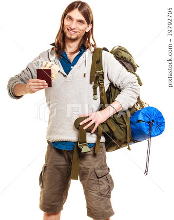 Man tourist backpacker holding money and passport. Man tourist backpacker holding money and passport. 19792705