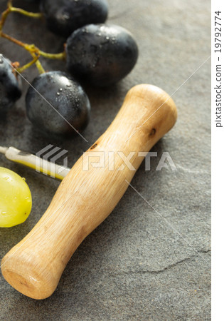 corkscrew and grape 19792774