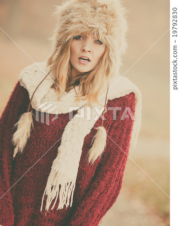 Portrait of pretty fashion woman in fur winter hat Portrait of pretty fashion woman in fur winter hat 19792830
