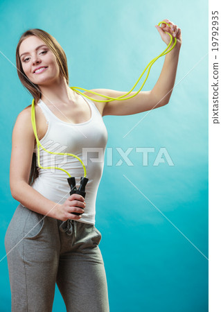 Fit woman with jumping rope 19792935