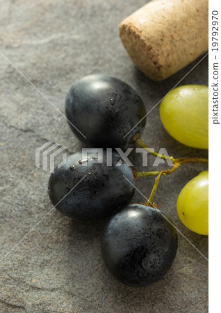 grapes and wine cork grapes and wine cork 19792970