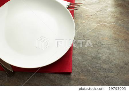 plate, knife and fork on napkin 19793003