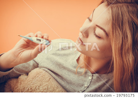 Sick ill woman with digital thermometer. Sick ill woman with digital thermometer. 19793175