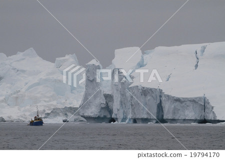 Arctic iceberg and fishing boat Arctic iceberg and fishing boat 19794170