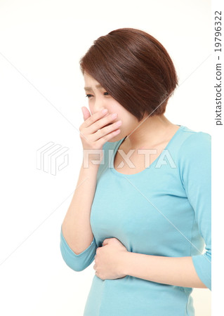 A woman holding a nausea 19796322
