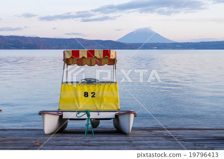 lonely watercycle boat at lake 19796413