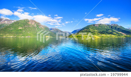 Meadows and village on Hardanger Fiord. Meadows and village on Hardanger Fiord. 19799944