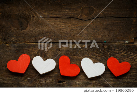 Red and white hearts on old wooden background Red and white hearts on old wooden background 19800290