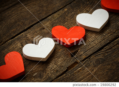Red and white hearts on old wooden background Red and white hearts on old wooden background 19800292