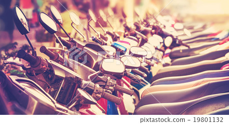 Vintage stylized picture of scooters in a row. 19801132