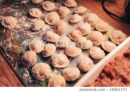 Russian dumplings made by hands are preparing for Russian dumplings made by hands are preparing for 19801373