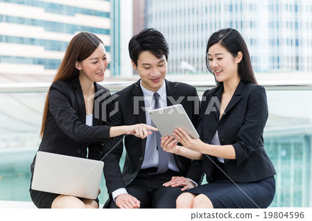 Business group of people using laptop computer and tablet comput 19804596