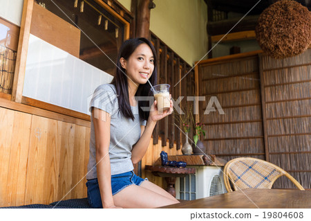 Woman drinking of coffee Woman drinking of coffee 19804608
