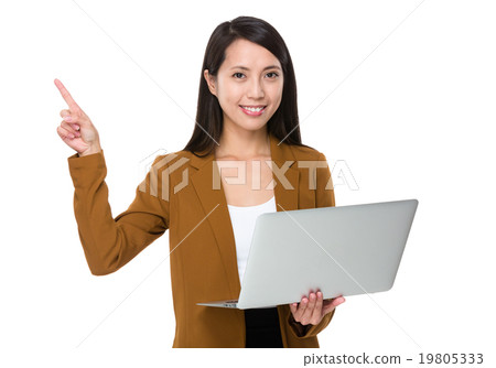 Businesswoman hold with laptop and finger point up 19805333