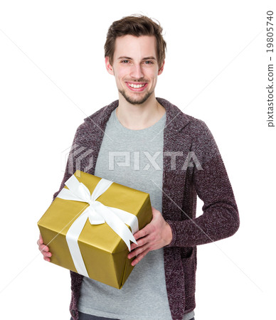 Boyfriend hold a gift box for his girlfriend Boyfriend hold a gift box for his girlfriend 19805740