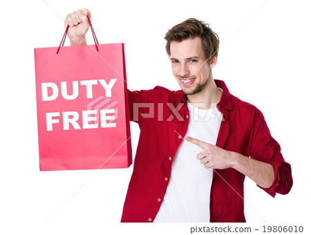 Happy shopping man with paper and showing duty free 19806010