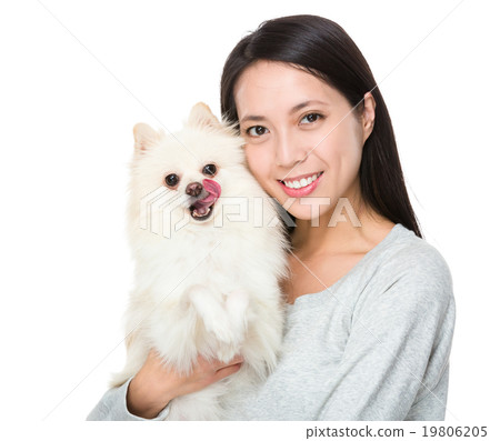 Woman with pomeranian dog 19806205