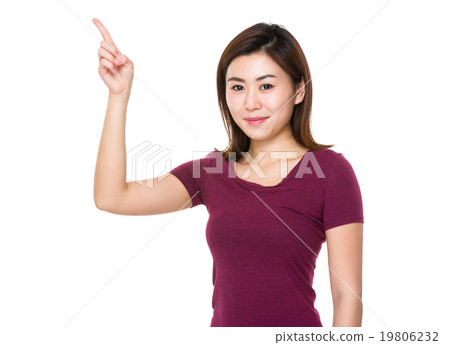 Asian woman with finger point upwards Asian woman with finger point upwards 19806232