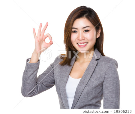 Asian businesswoman with ok sign gesture Asian businesswoman with ok sign gesture 19806233