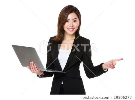 Businesswoman hold with laptop and finger up Businesswoman hold with laptop and finger up 19806273