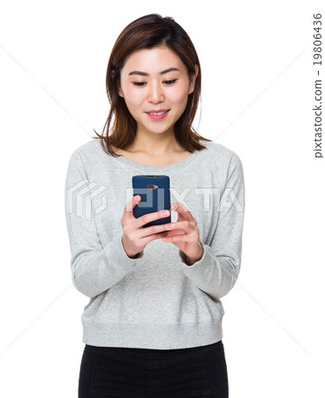 Asian Woman use of the cellphone Asian Woman use of the cellphone 19806436