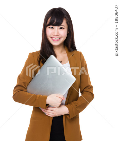 Young businesswoman hold with laptop computer Young businesswoman hold with laptop computer 19806437