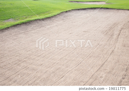sand bunker and green grass of golf course sand bunker and green grass of golf course 19811775