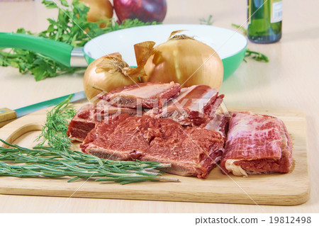 meat and frying pan meat and frying pan 19812498