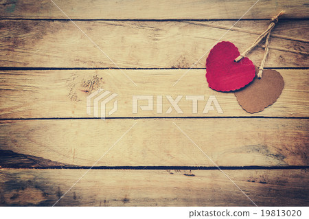 Two red and brown heart on wooden background Two red and brown heart on wooden background 19813020