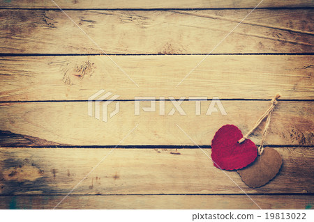 Two red and brown heart on wooden background Two red and brown heart on wooden background 19813022