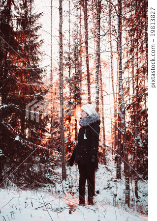 Pretty girl in a white hat and a jacket on a 19813827