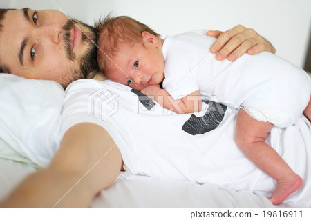 Newborn with his father Newborn with his father 19816911