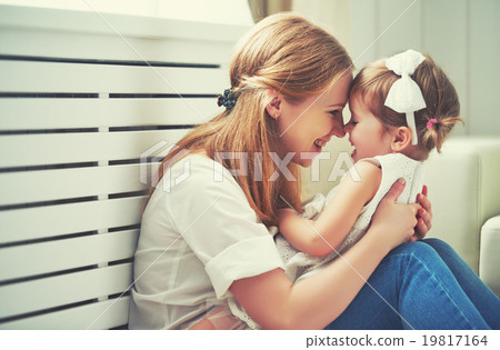 Stock Photo: Happy loving family. mother and child playing, kissing and hugg